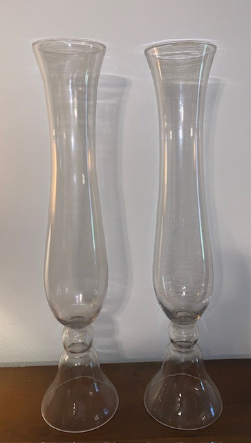 Vase - Clear Glass - 38in tall. Top 5-1/2in dia. Bottom 7" dia. Price is per piece