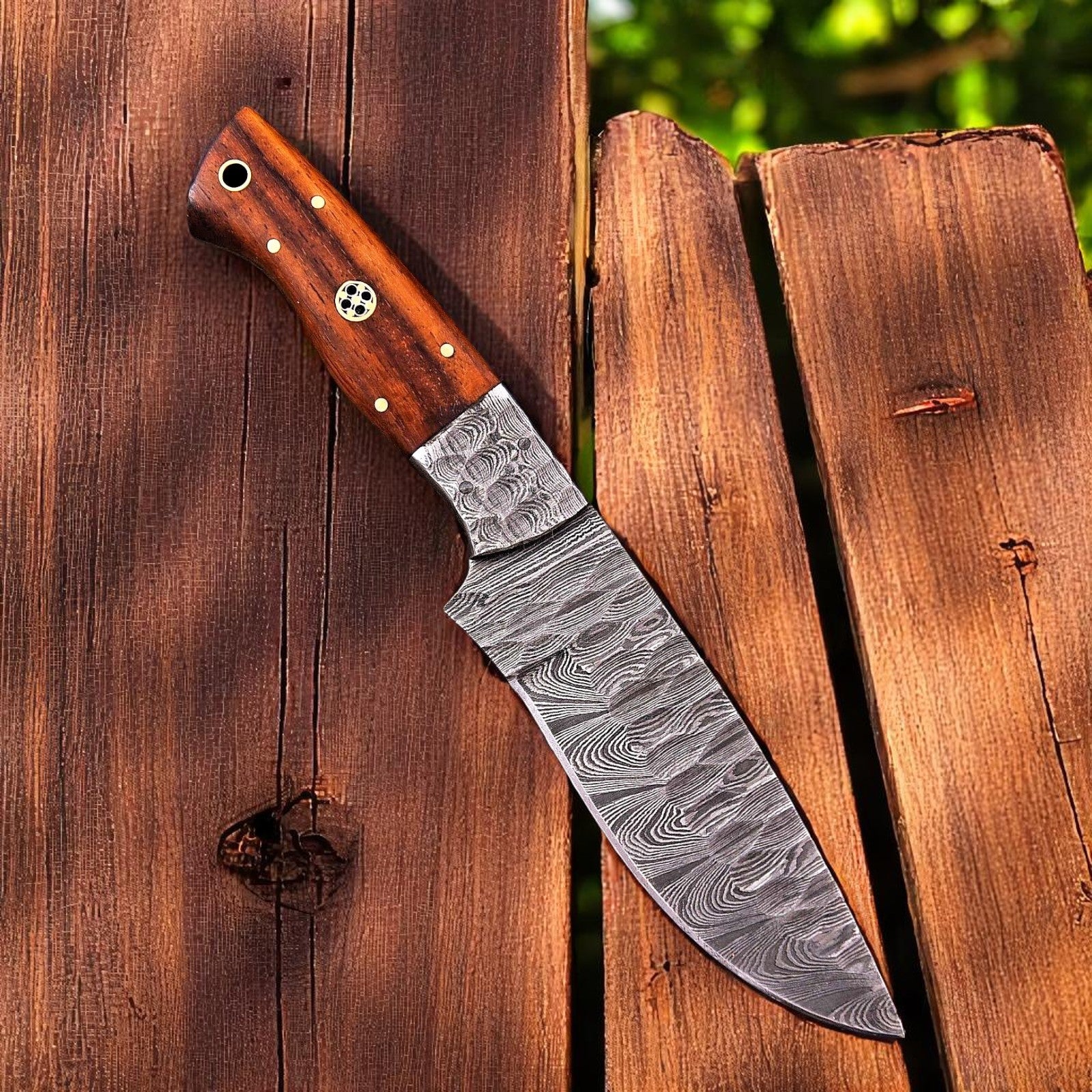 Handmade Damascus hunting knife with rosewood handle sold by Baygall Trading Co