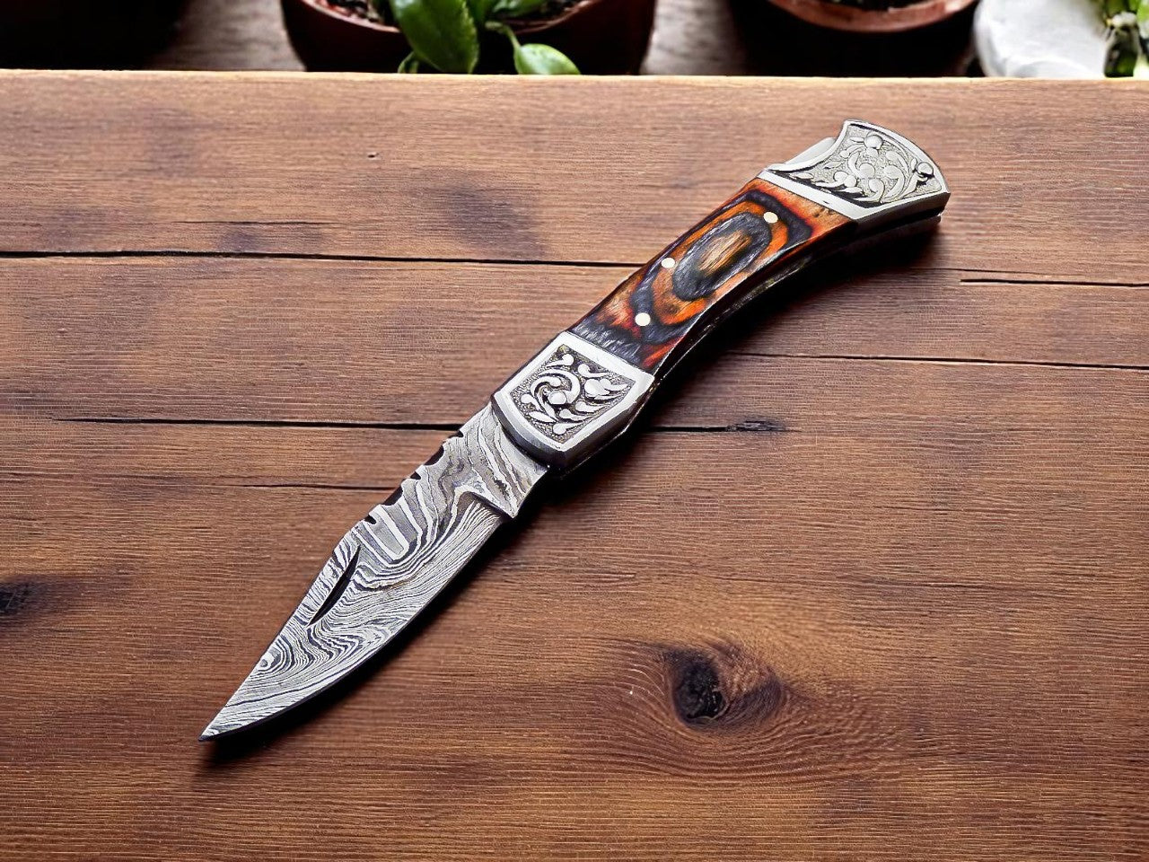 Custom handmade damascus folding knife sold by Baygall Trading Co