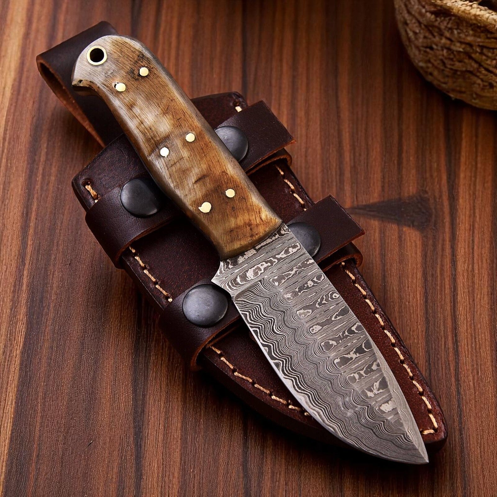 custom handmade damascus hunting knife with sheep horn handle sold by Baygall Trading Co
